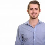 portrait-of-happy-young-handsome-bearded-businessm-FPL6W3L.jpg